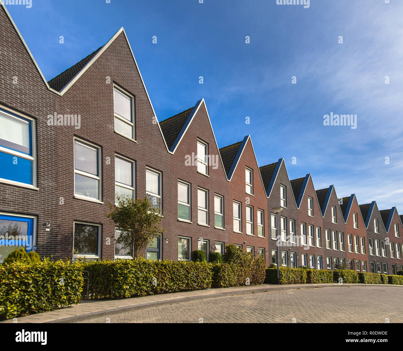 Modern Street with Terraced Real Estate for Families in the Netherlands Stock Photo
