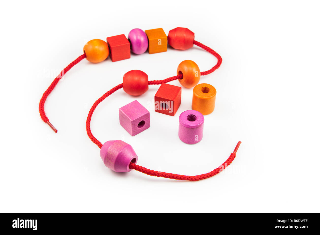 Wooden Beads on a String making a Colorful Toy Necklace Stock Photo Alamy