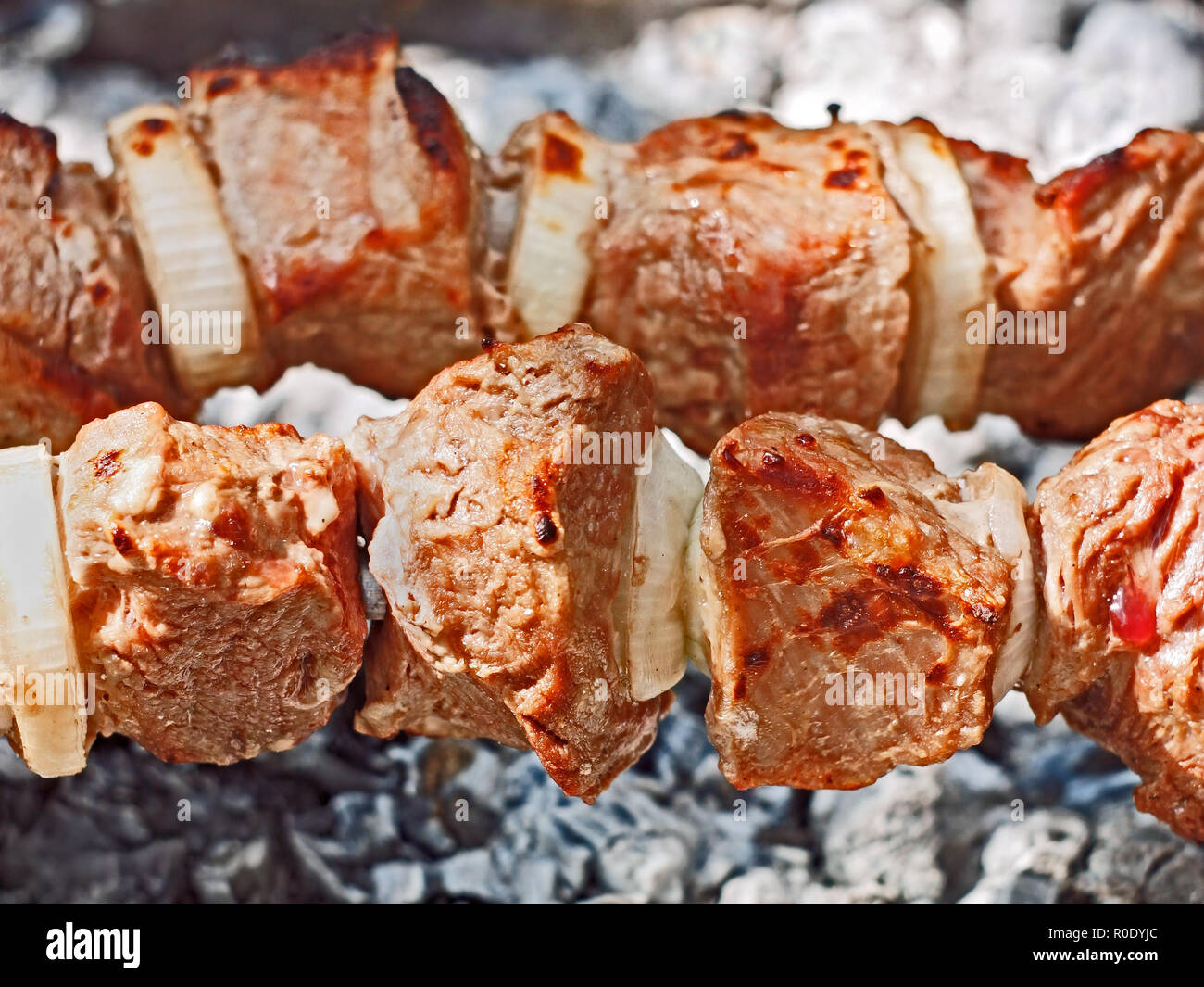 Meat on skewers roasted in chargrill close up Stock Photo Alamy