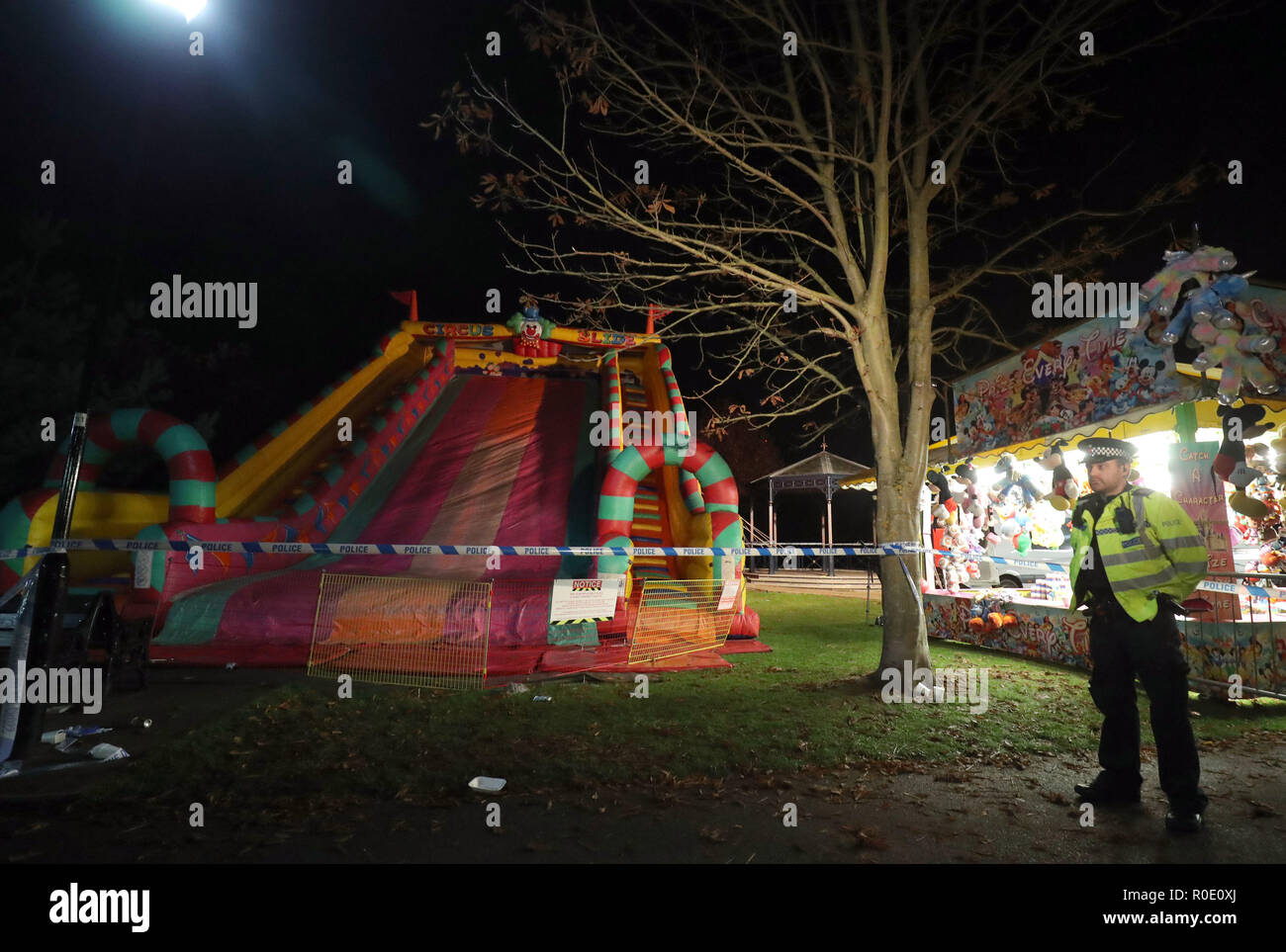 A view of the scene at a fireworks funfair in Woking Park, Surrey, where eight children are being treated for 'potentially serious injuries' after an incident on an inflatable slide. Stock Photo