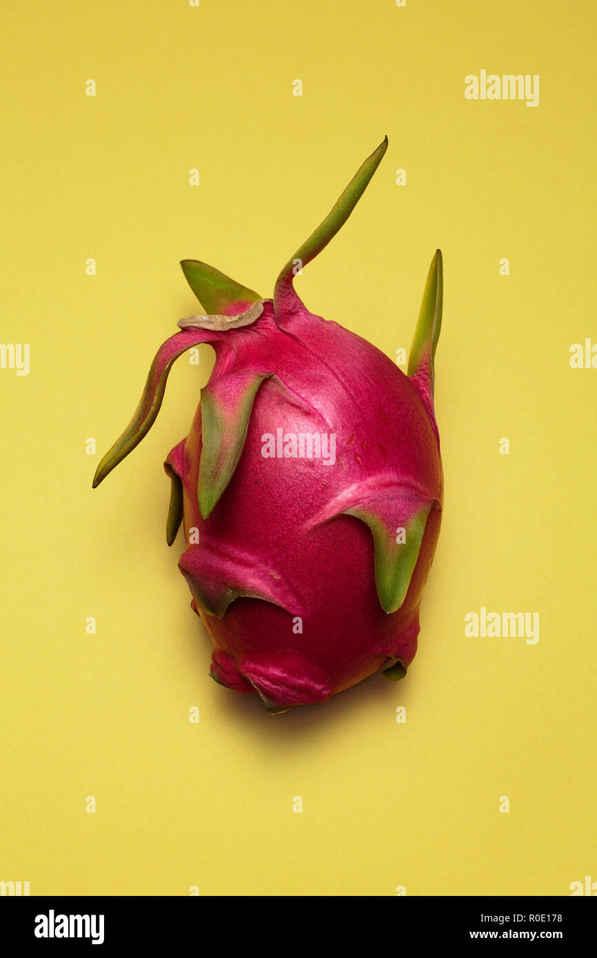 Dragon Fruit on Yellow Background Stock Photo