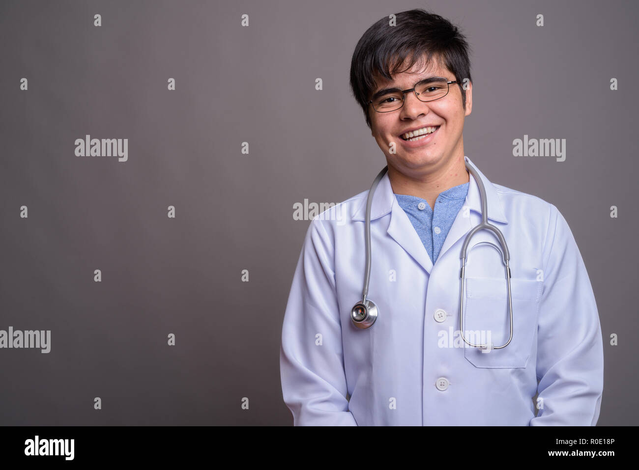 Asian teenager and doctor hi-res stock photography and images - Alamy
