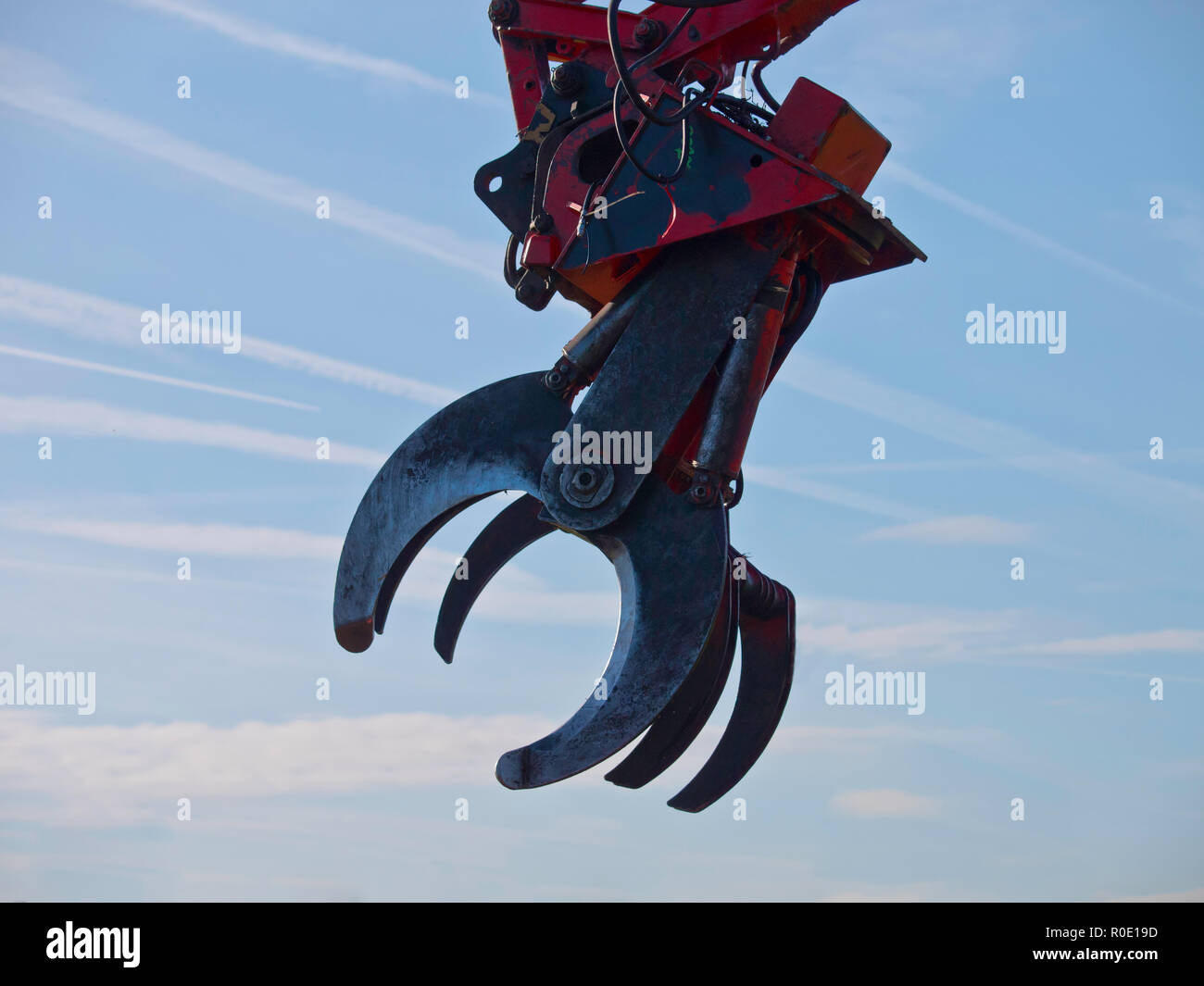 Heavy industry cutting claw on the arm of a hydraulic crane Stock Photo