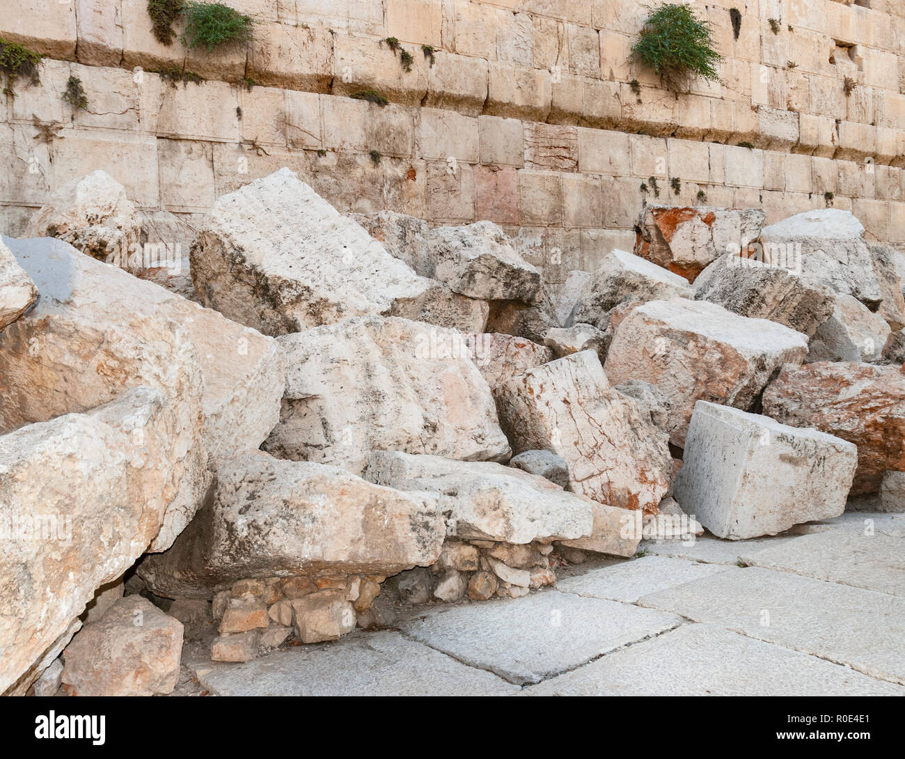 closeup of stones thrown from the second temple to the street below after the destruction of the temple in 70 CE Stock Photo