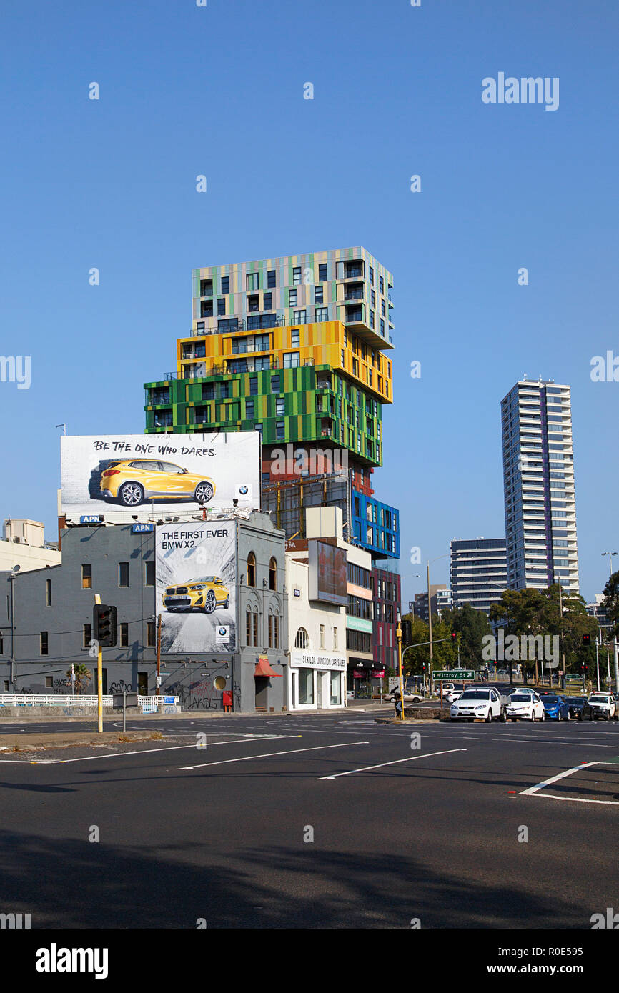 Melbourne, Australia: April 04, 2018: Street view of the 18 storey Lego Apartment complex in Melbourne located in St Kilda - with advertising boarding Stock Photo