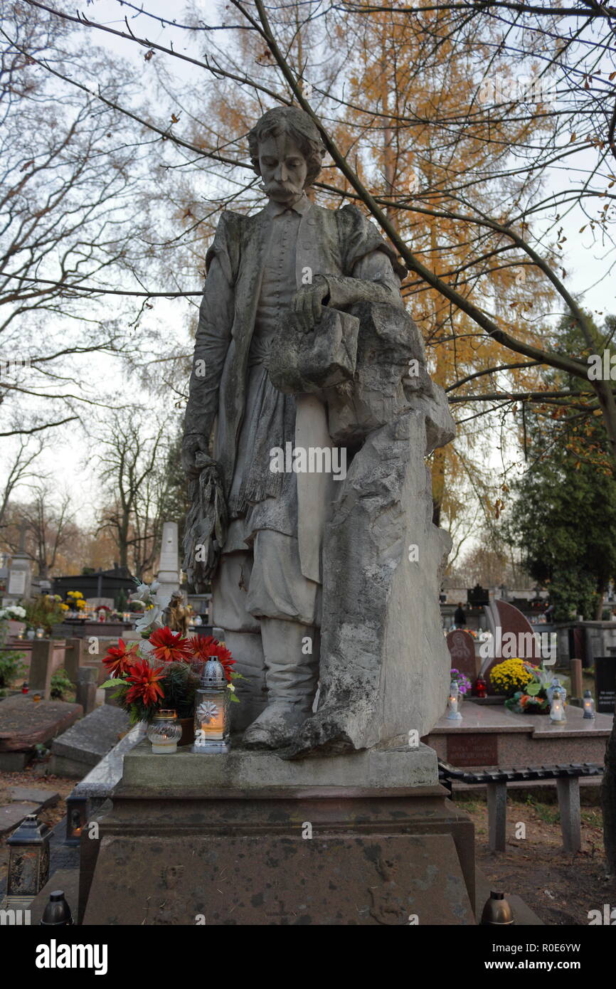 All Saints' Day. Tombstone sculpture of a nobleman in old cemetery in Poland Stock Photo