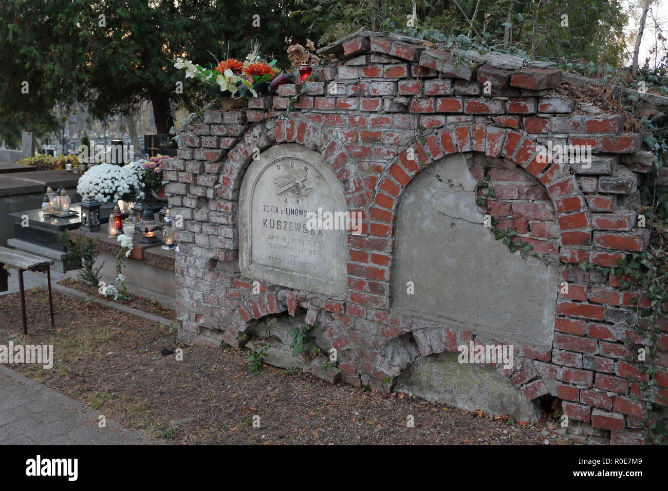 All Saints' Day. Old, brick and concrete, tomb in cemetery in Poland Stock Photo