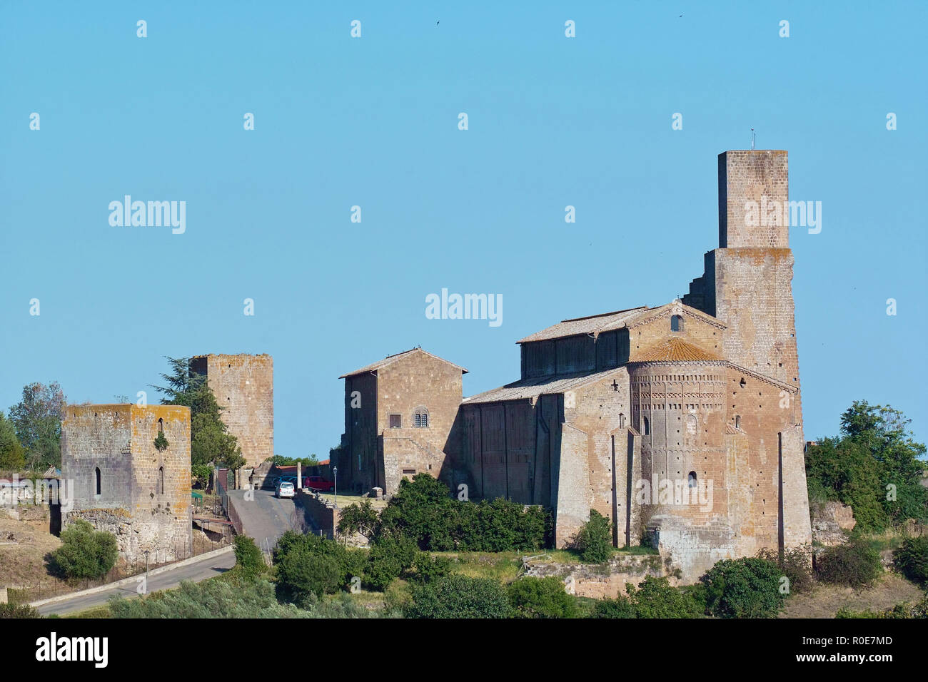 sight of the hill of st. peter with the outside and the apse of the church, tuscania, province of viterbo, lazio, italy Stock Photo