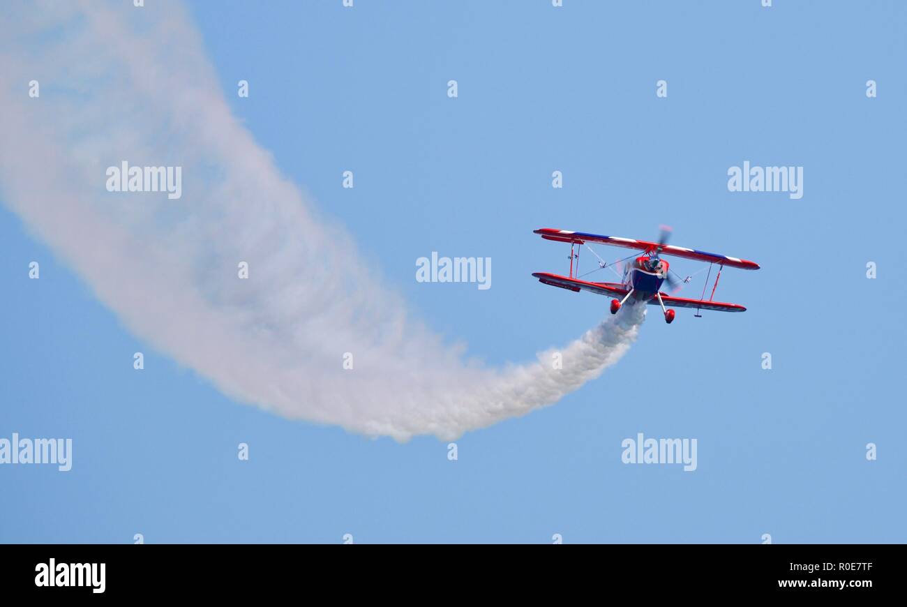 Rich Goodwin performs high energy aerobatic manoeuvres in his Super Pitts S2S (G-EWIZ) Muscle biplane at the 2018 Bournemouth Air Festival Stock Photo