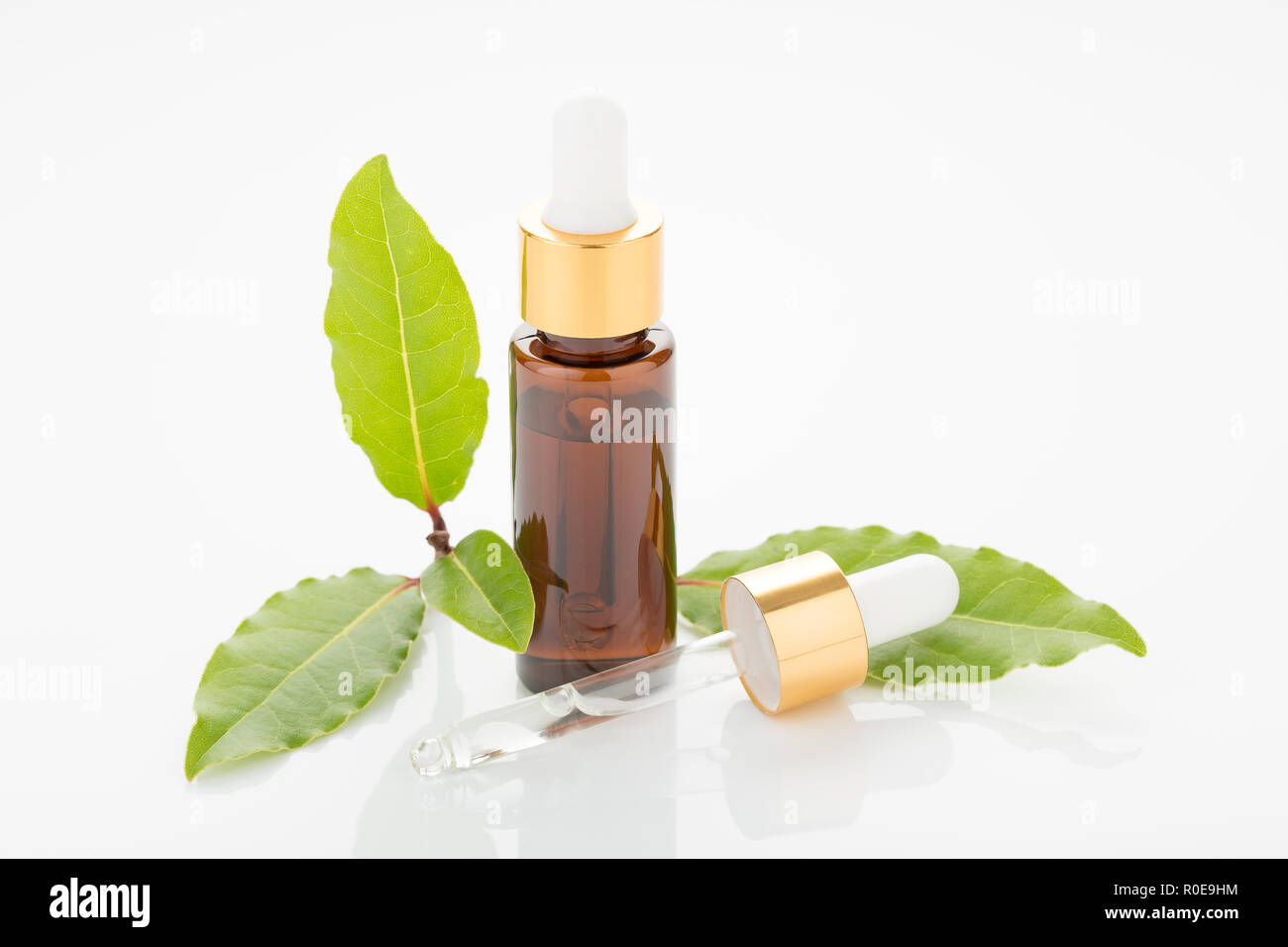 Bay essential oil. Clean style Stock Photo Alamy