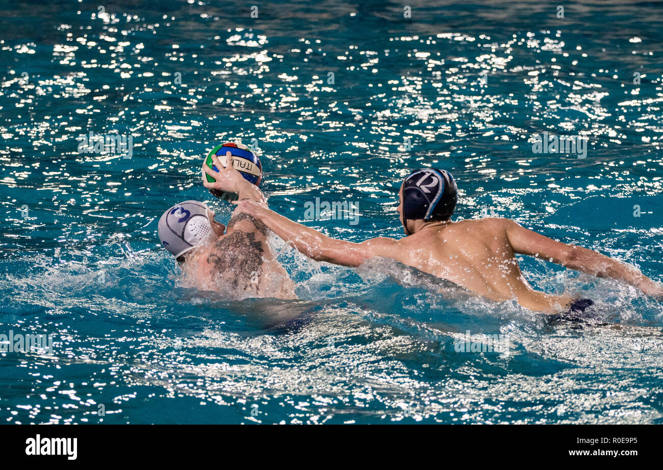 Two waterpolo players during a defense actionk - A series of shots depicting water polo players,.Game actions, attack, defense and goal. Stock Photo