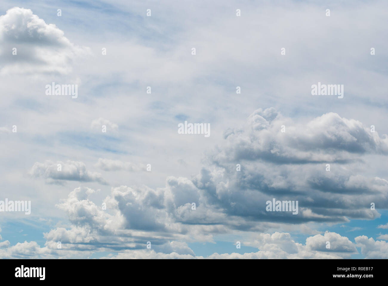 White cumulus and cirrus clouds in the blue sky Stock Photo - Alamy