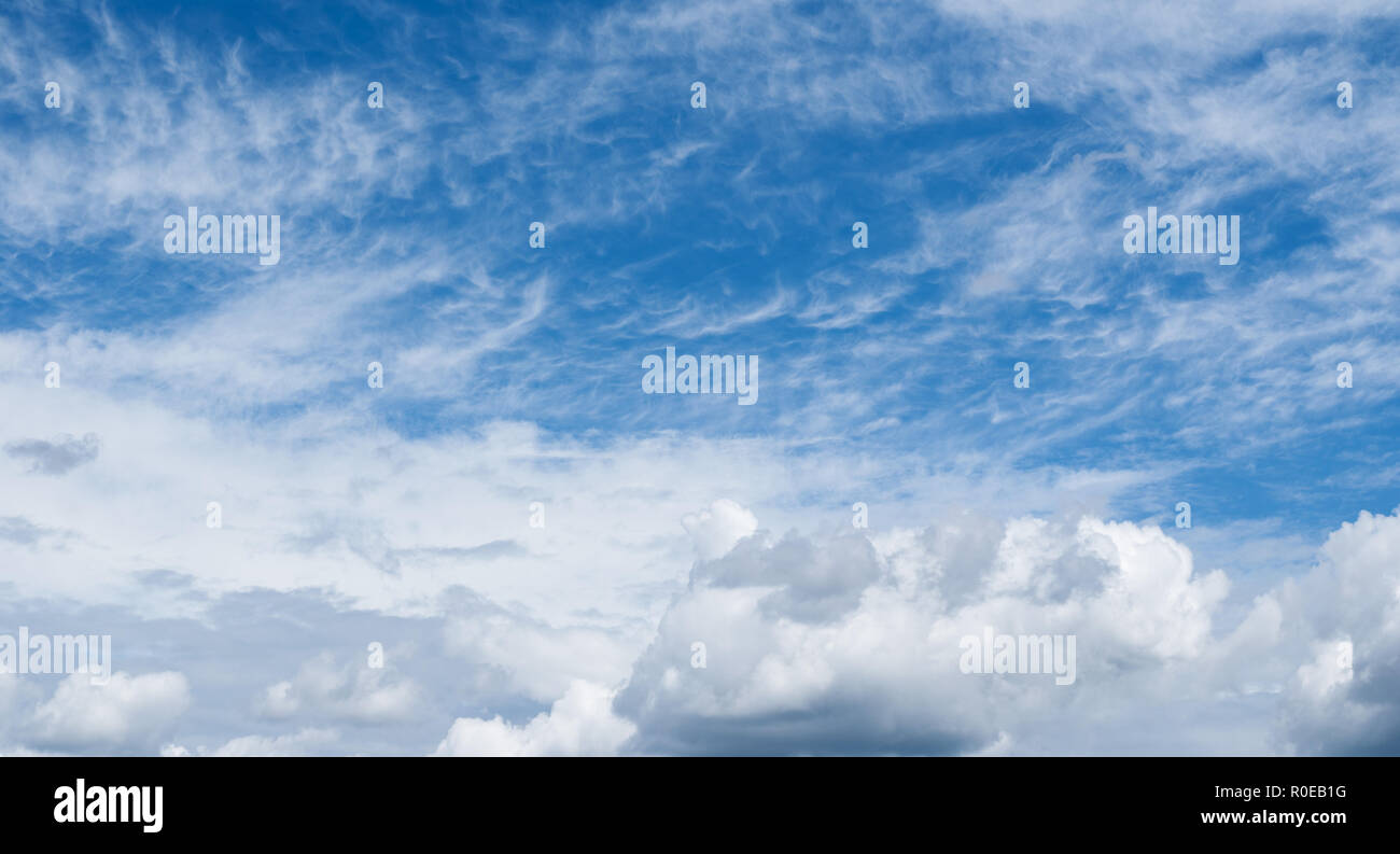 White cumulus and cirrus clouds in the blue sky Stock Photo - Alamy
