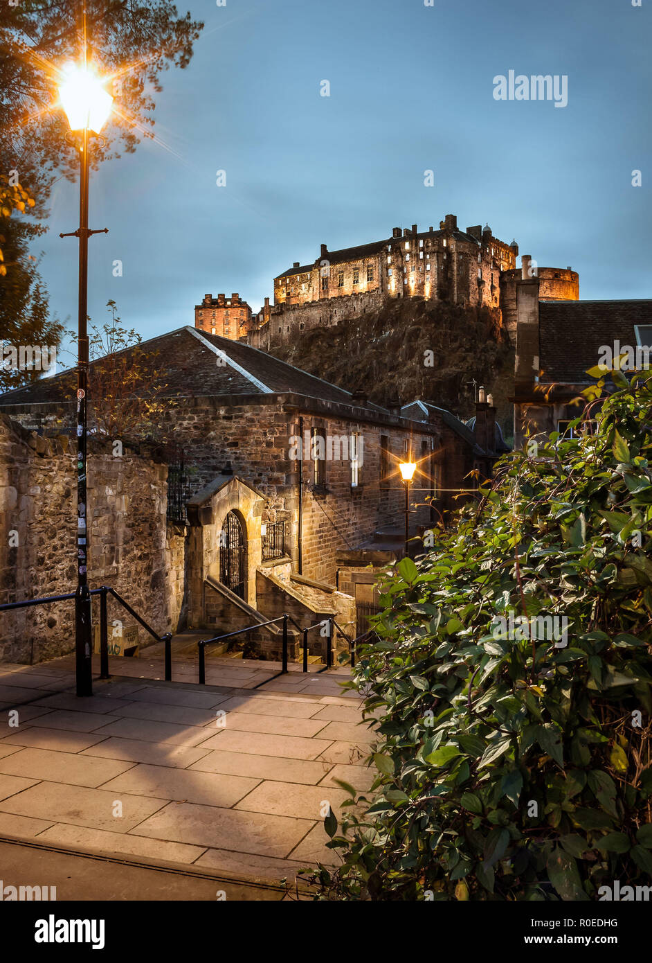 View of Edinburgh's Castle, in Scotland, from The Vennel steps at dusk
