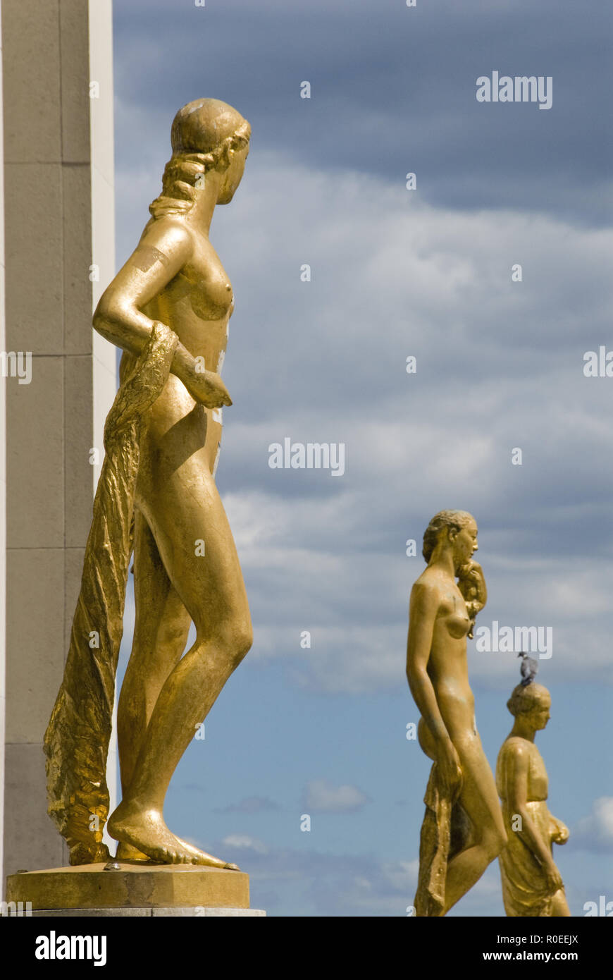 Eight gold figures representing the rights of man stand in the Place du Trocadero, outside the Palais de Chaillot, Paris, France. Stock Photo