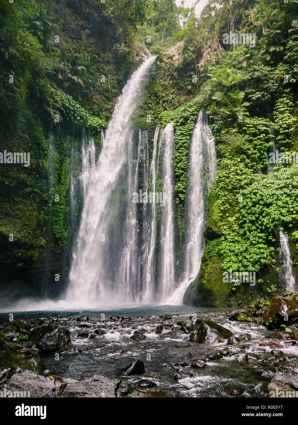 A waterfall in Indonesia - Lombok. Stock Photo