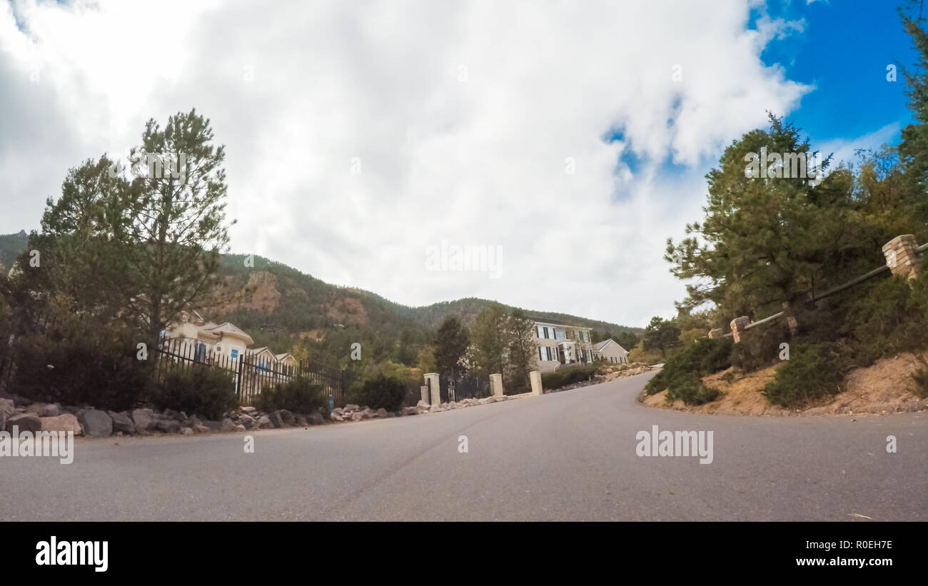 Driving through upscale residential neighborhood of Colorado Springs in Autumn. Stock Photo