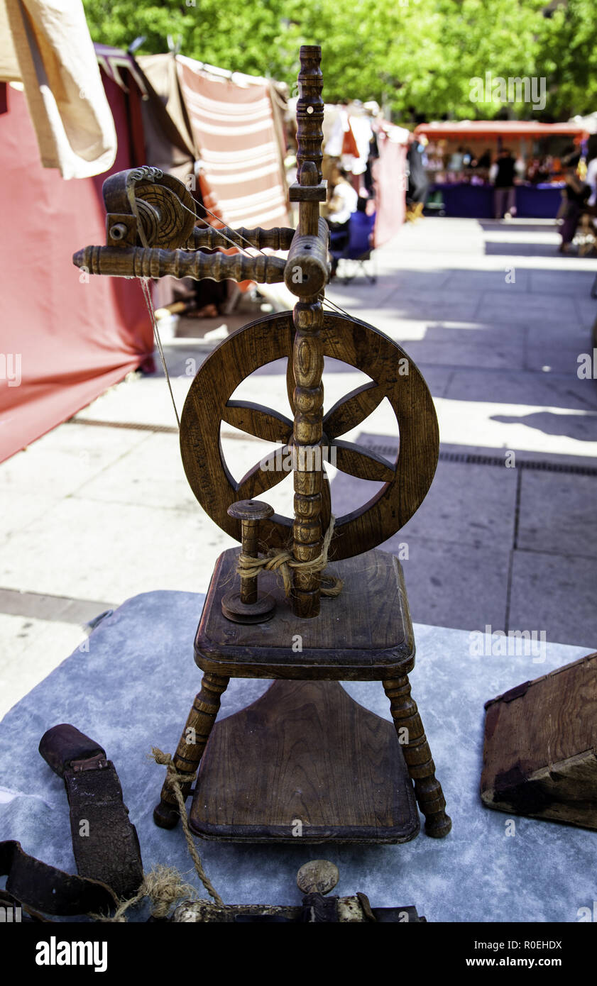 Making sheep wool thread by traditional spinning wheel , Thailand Stock  Photo