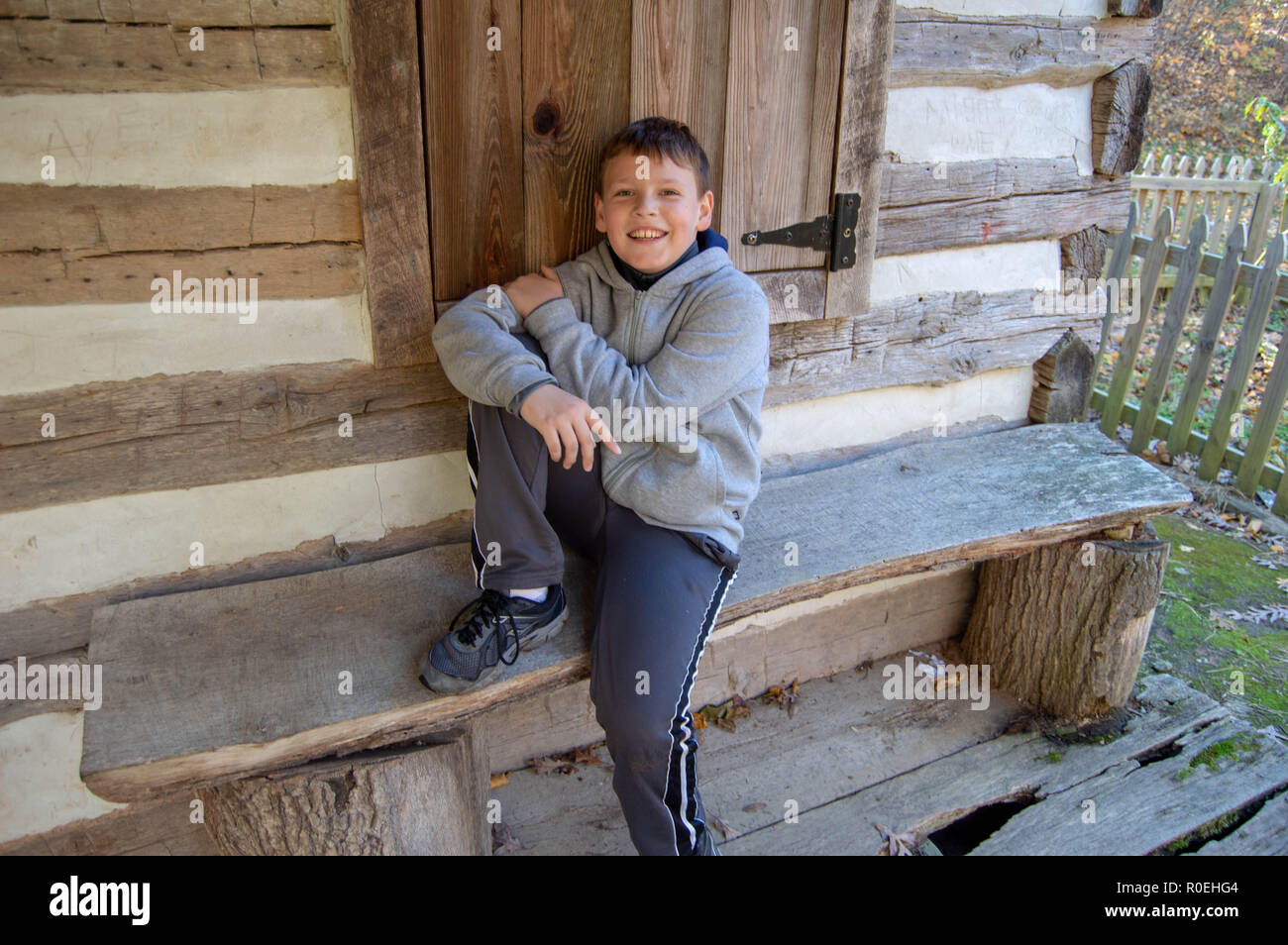 Child on Bench Stock Photo Alamy
