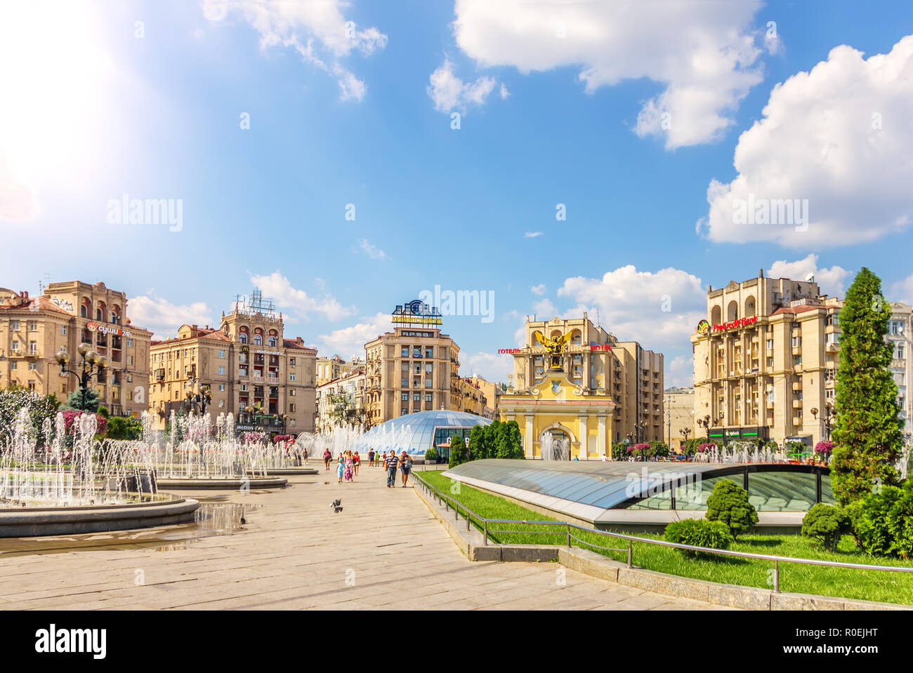 Kiev, Ukraine - August 15, 2018: Independence Square fountains, and buildings and Lach Gates in summer Stock Photo