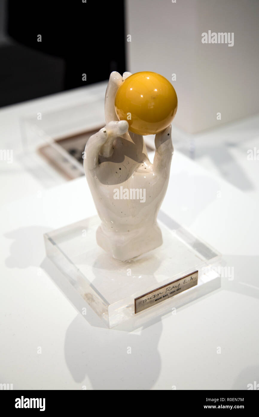 'Main Ray' surrealist sculpture of hand holding yellow ball at the Man Ray Gagosian display at Frieze Masters 2018 in London, UK Stock Photo