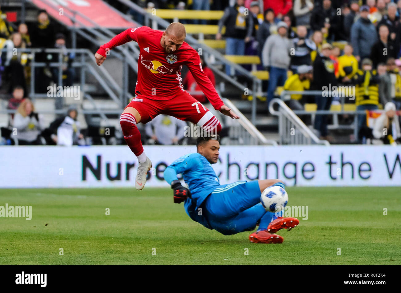 Sunday, November 04, 2018: Columbus Crew SC goalkeeper Zack Steffen (23) comes out to slide tackle the ballfrom New York Red Bulls midfielder Daniel Royer (77) in the second half of the match between New York Red Bulls and Columbus Crew SC in the Conference Semi-finals Leg 1 of 2 at MAPFRE Stadium, in Columbus OH. Mandatory Photo Credit: Dorn Byg/Cal Sport Media. Columbus Crew SC 1 - New York Red Bulls 0 Stock Photo