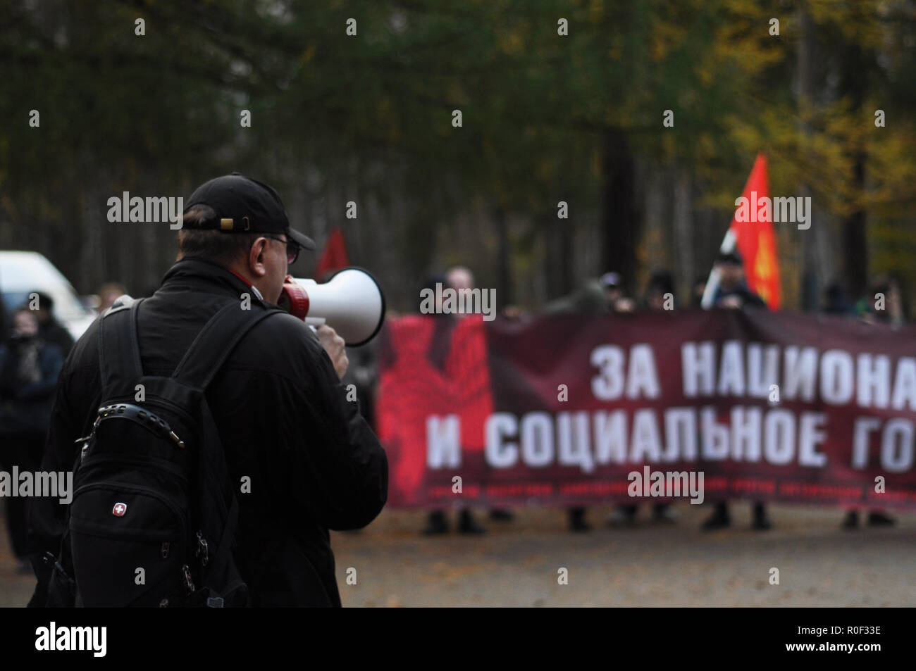 Saint Petersburg, Russia, 4th November, 2018. Russian nationalists hold a protest march and demonstration in Udelniy Park in Saint Petersburg, Russia, to celebrate National Unity Day, chanting oppositional and nationalist slogans. Credit: Aleks Lokhmutov/Alamy Live News Stock Photo