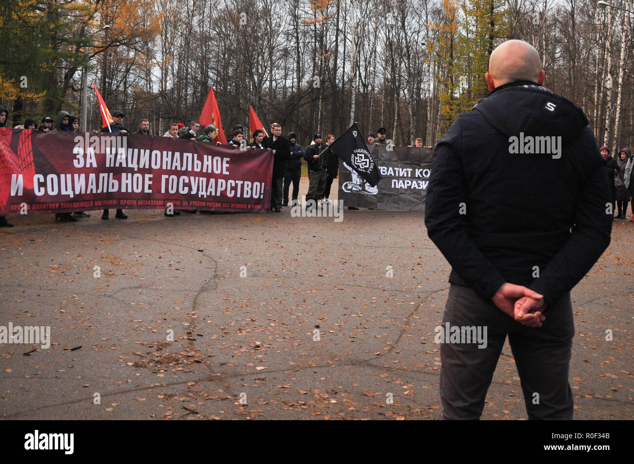 Saint Petersburg, Russia, 4th November, 2018. Russian nationalists hold a protest march and demonstration in Udelniy Park in Saint Petersburg, Russia, to celebrate National Unity Day, chanting oppositional and nationalist slogans. Credit: Aleks Lokhmutov/Alamy Live News Stock Photo
