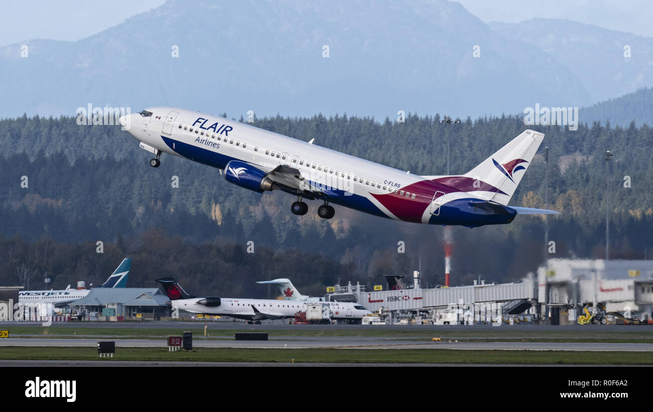 Richmond, British Columbia, Canada. 4th Nov, 2018. A Flair Airlines Boeing 737-400 (C-FLRS) single-aisle narrow-body jet airliner takes off from Vancouver International Airport. The airline has started ultra-low-cost sevice in Canada and is headquartered in Edmonton, Alberta. Credit: Bayne Stanley/ZUMA Wire/Alamy Live News Stock Photo