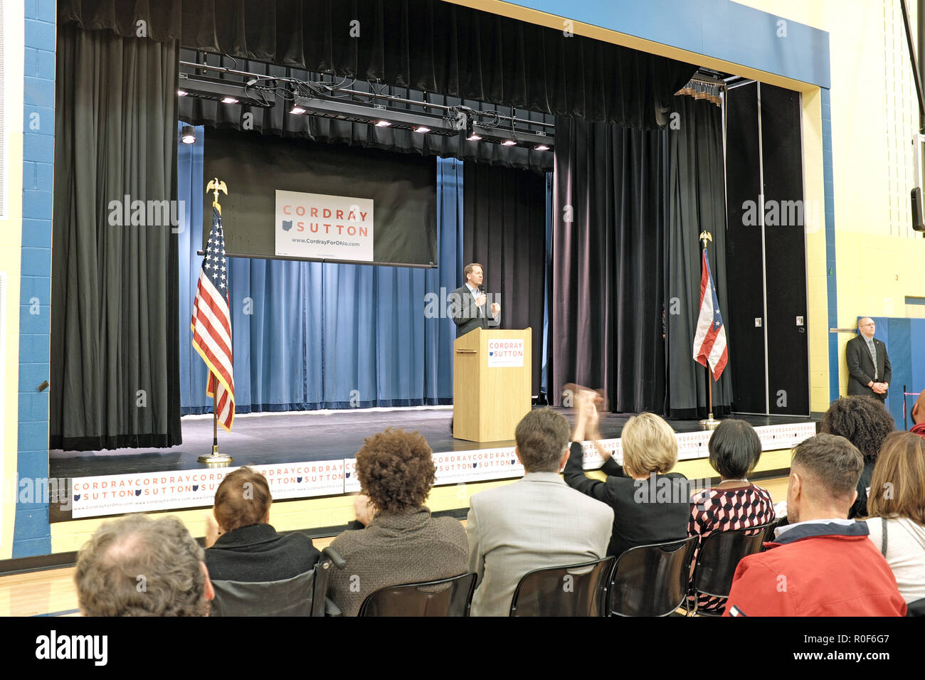 Cleveland, Ohio, USA.  4th Nov, 2018.  Richard Cordray speaks at the podium during a democratic rally at George Washington Carver School in Cleveland, Ohio, USA.  He is on stage campaigning to be the next governor of Ohio during the upcoming US midterm elections.  Credit: Mark Kanning/Alamy Live News. Stock Photo