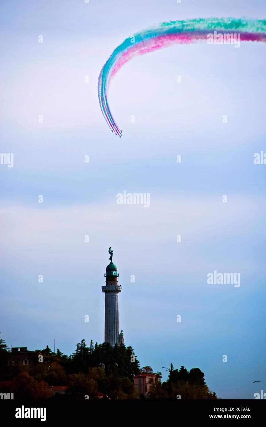 4 11 2018 Trieste, Italy. Acrobatic air performance of Frecce tricolori -- tricolour arrows. Stock Photo