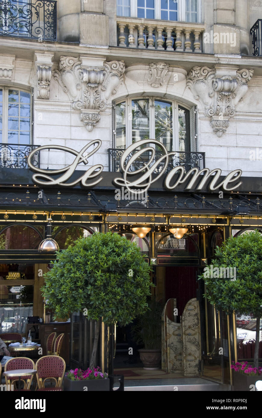 Le Dome, an historic cafe that was popular with many writers and artists in the Montparnasse area of Paris, France. Stock Photo