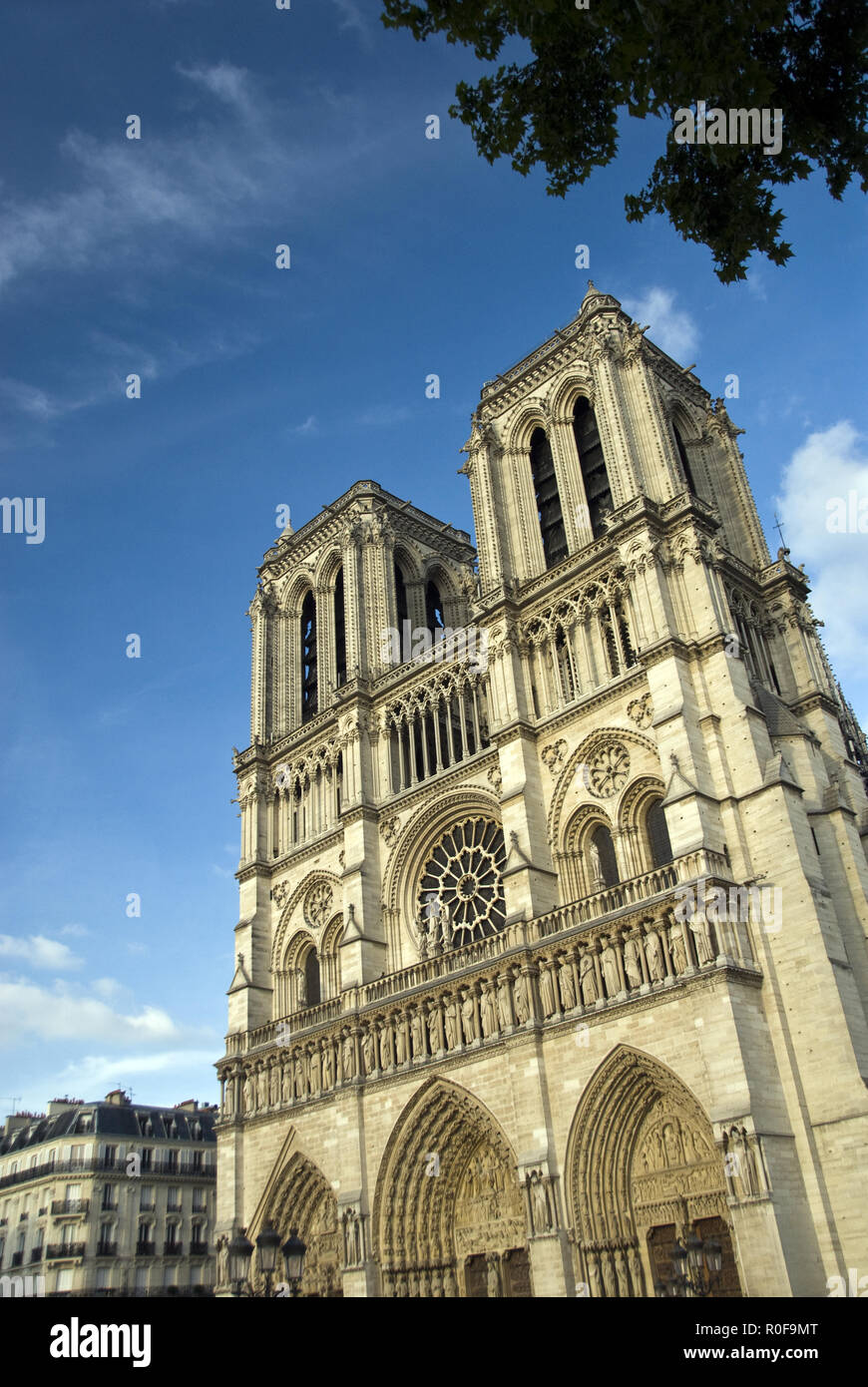 The western facdae of Notre-Dame features two bell towers; the cathedral is one of the finest examples of French Gothic architecture, Paris, France. Stock Photo