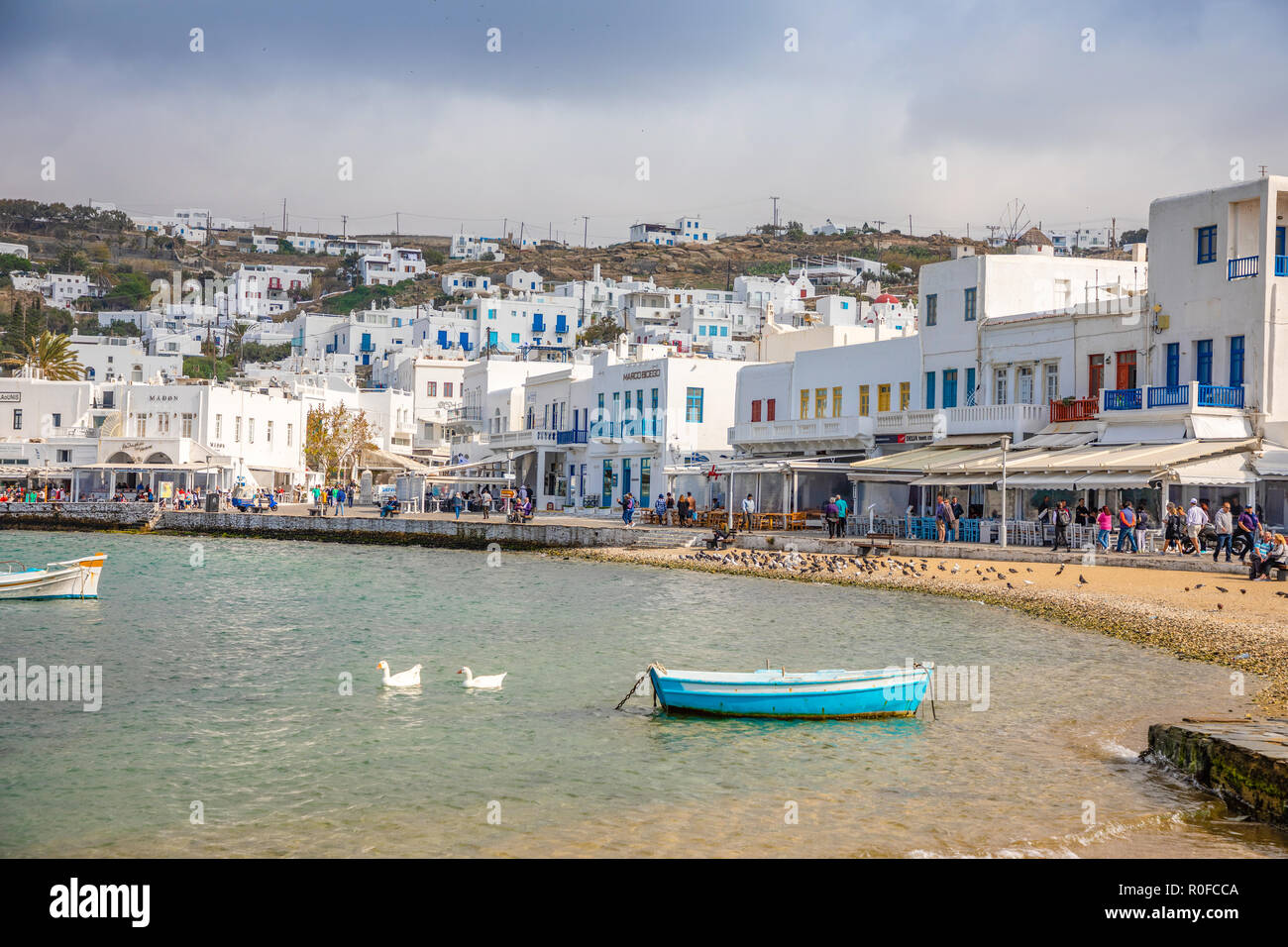 Mykonos, Greece - 17.10.2018: Port of Mykonos Town with white arhitecture and colorfull boats, Greece Stock Photo