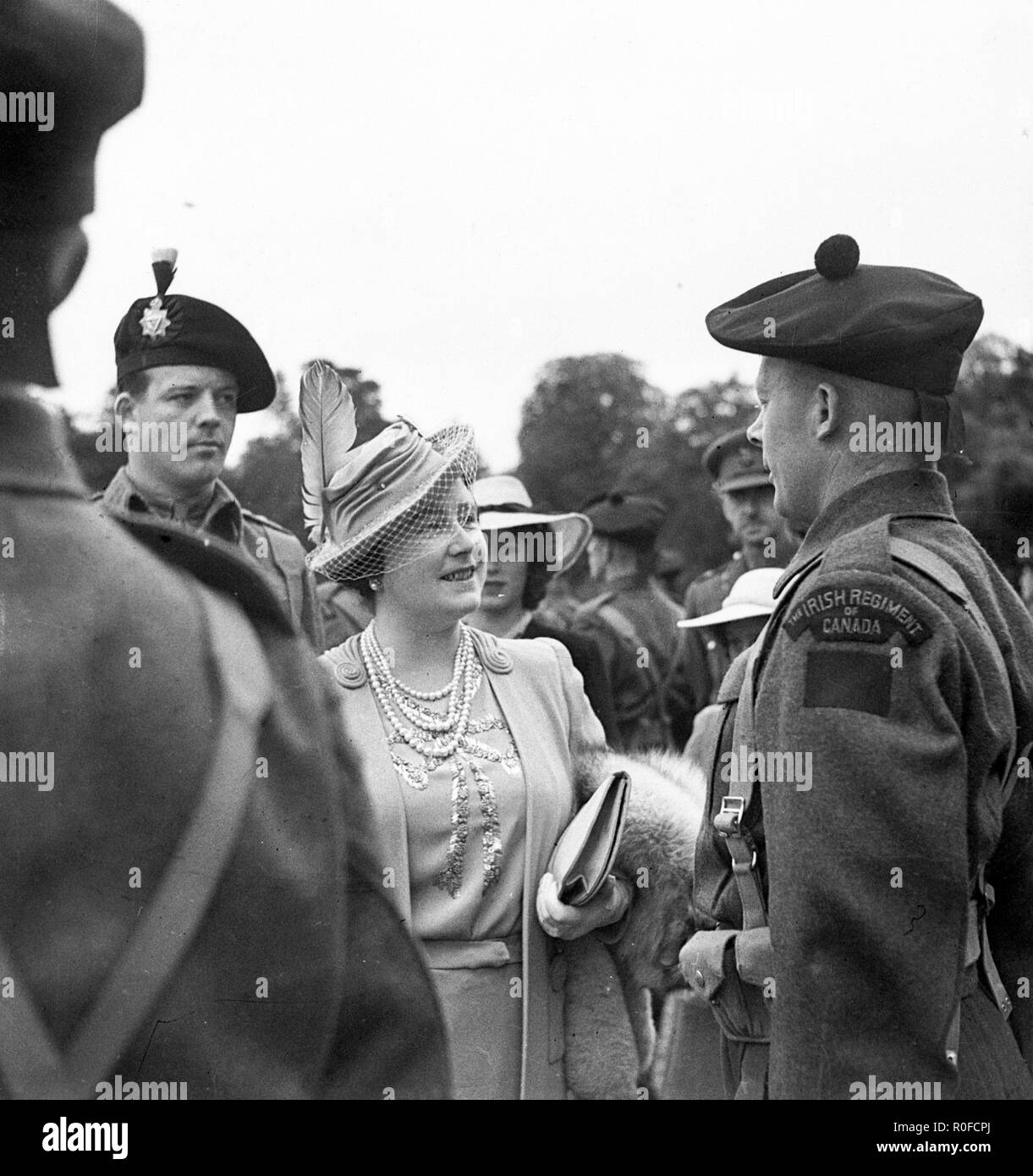 Queen Elizabeth visited THE IRISH REGIMENT OF CANADA at Sandringham Castle at the 8th of July 1943 Stock Photo