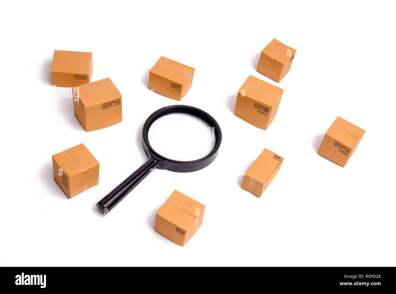 Cardboard boxes and a glass on a white background. The concept of