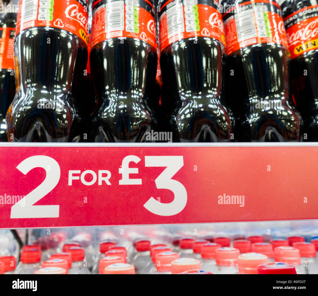 2 for 3 offer on sugary/fizzy drinks in UK shop. Stock Photo