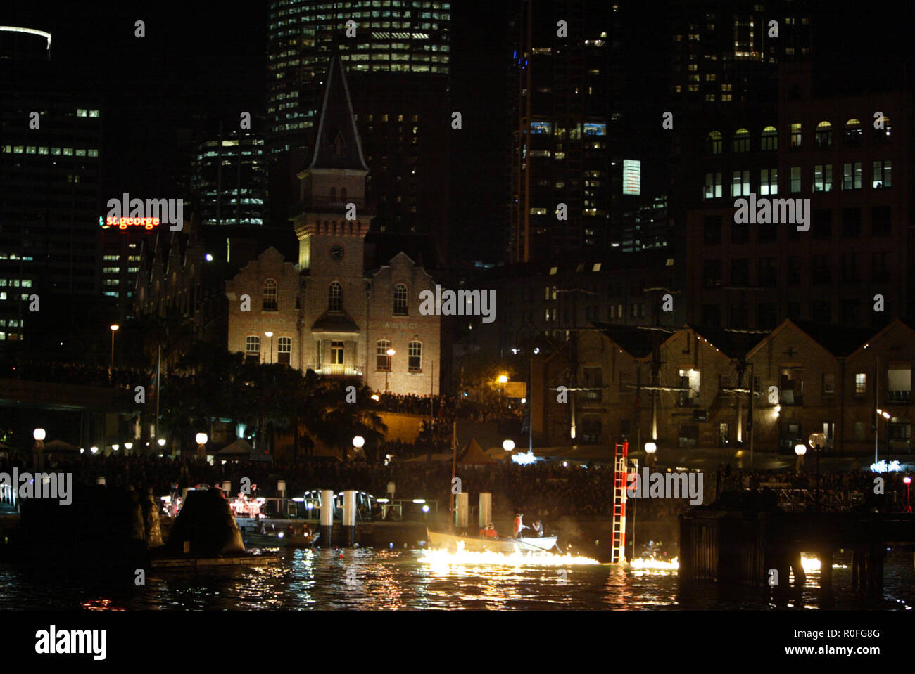 The fire that devastated the Australian convict ship 'Three Bees' in 1814 is dramatically re-created in Campbell's Cove on Sydney Harbour as part of 'Vivid Sydney' a festival of light, music and ideas held from 26 May to June 14, 2009.  Sydney, Australia. 12.06.09. Stock Photo