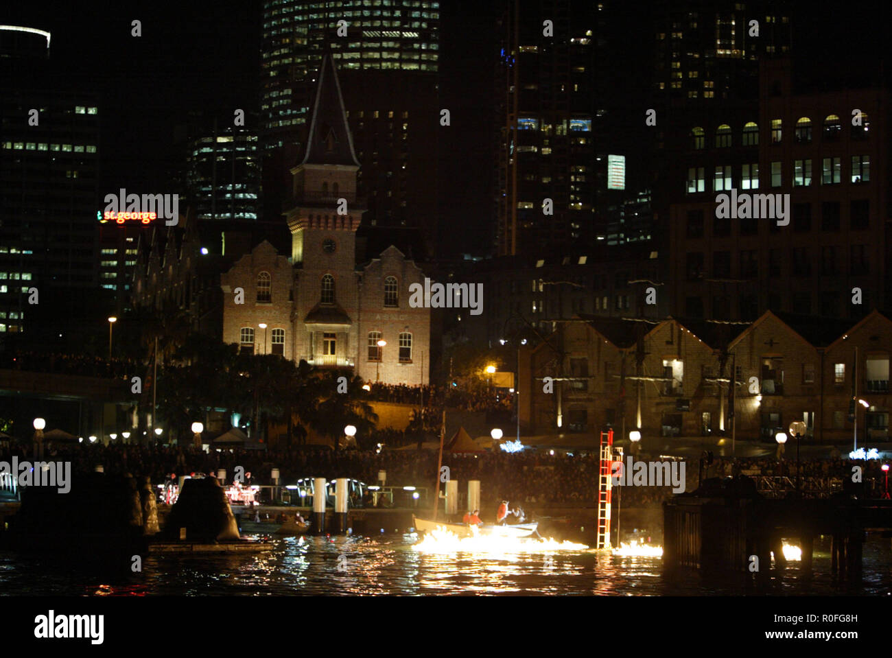 The fire that devastated the Australian convict ship 'Three Bees' in 1814 is dramatically re-created in Campbell's Cove on Sydney Harbour as part of 'Vivid Sydney' a festival of light, music and ideas held from 26 May to June 14, 2009.  Sydney, Australia. 12.06.09. Stock Photo