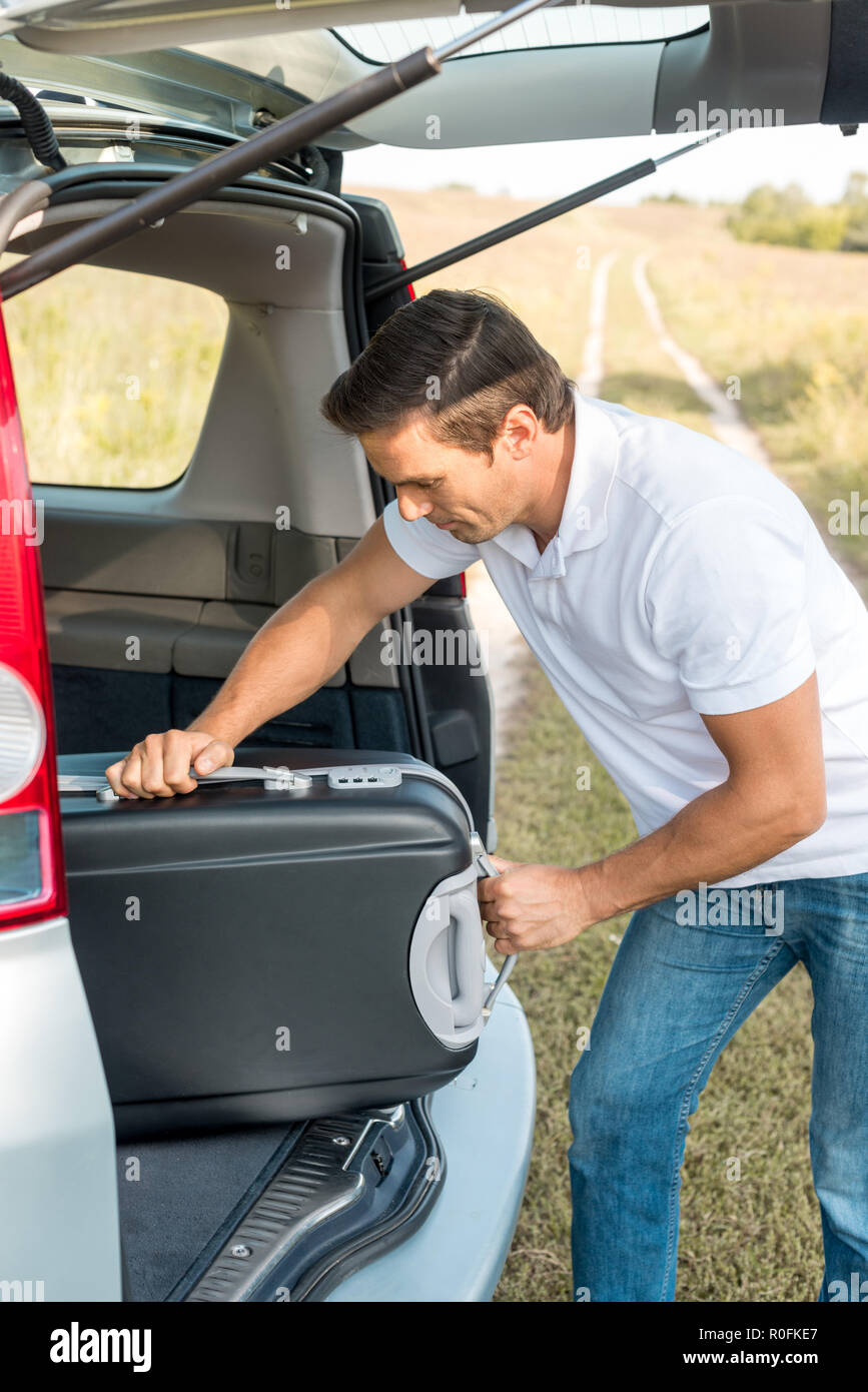 Man in car boot hi-res stock photography and images - Alamy