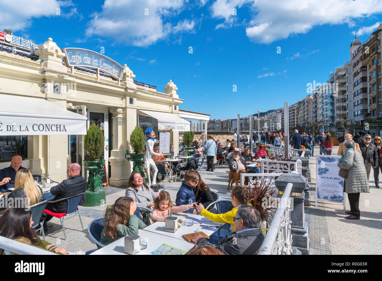 Cafe on the seafront promenade, Playa de la Concha, San Sebastian, Basque Country, Spain Stock Photo