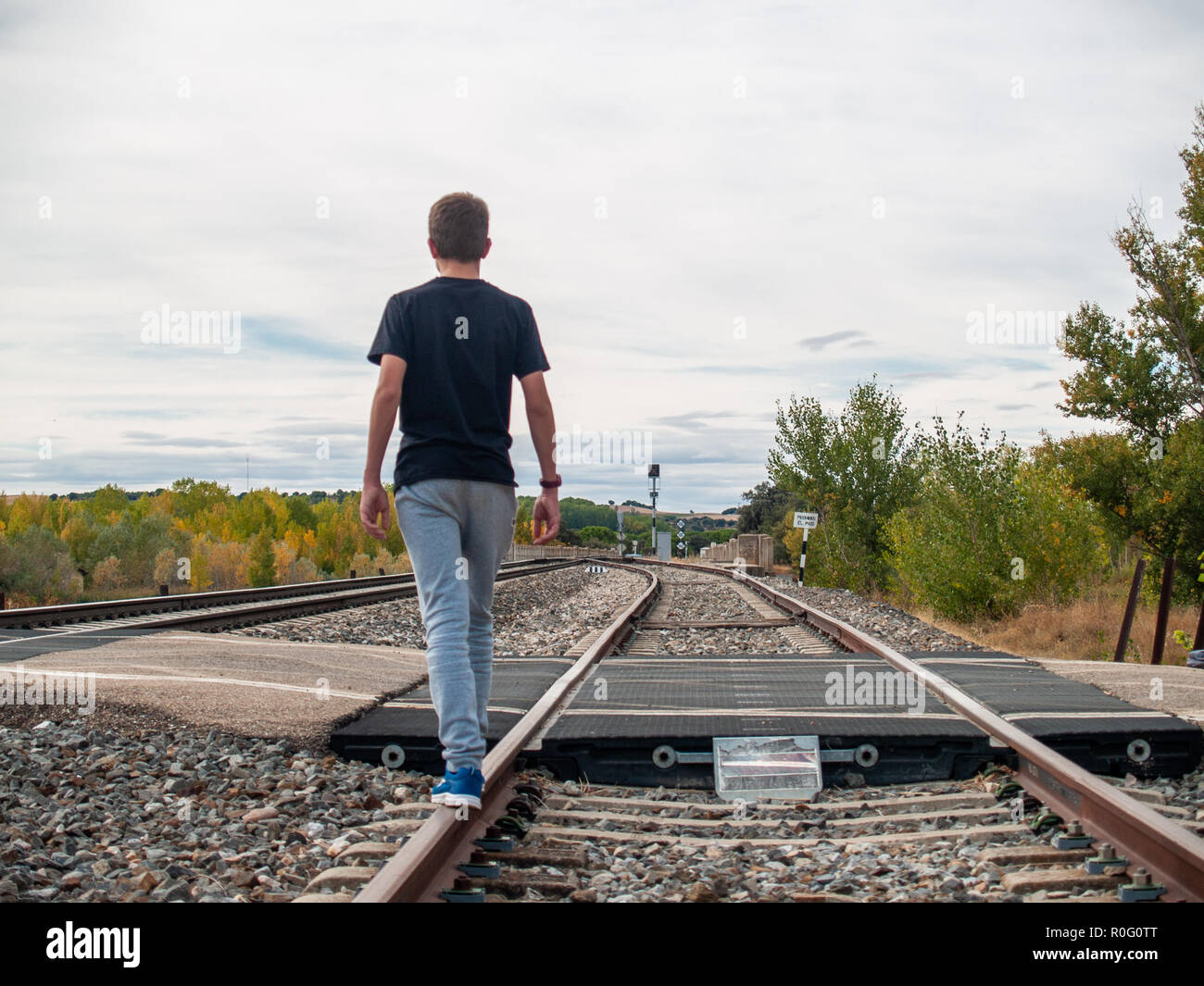 Boy On Railroad Track Stock Photos & Boy On Railroad Track Stock Images