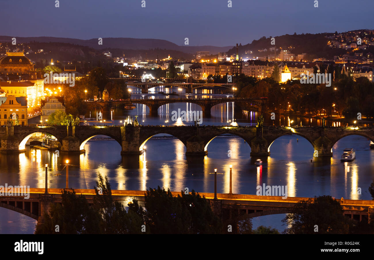 Bridges over Danube river in Prague at night, Czech Republic, panoramic, aerial view Stock Photo
