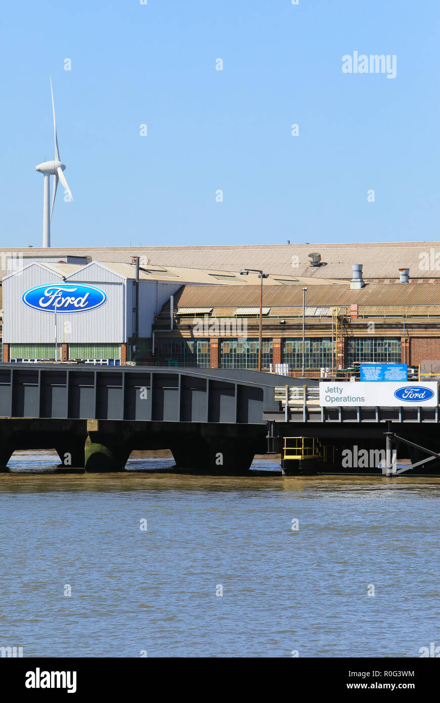 The jetty for Ford Dagenham, still producing vehicle engines, on the north bank of the River Thames, in Essex, UK Stock Photo