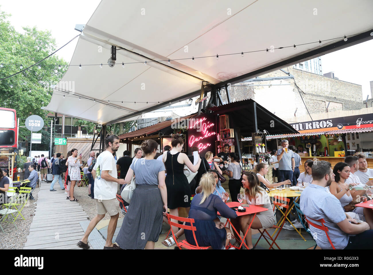 Trendy Mercato Metropolitano, in a disused paper factory, and part of the Elephant & Castle's regeneration project, in SE London, UK Stock Photo