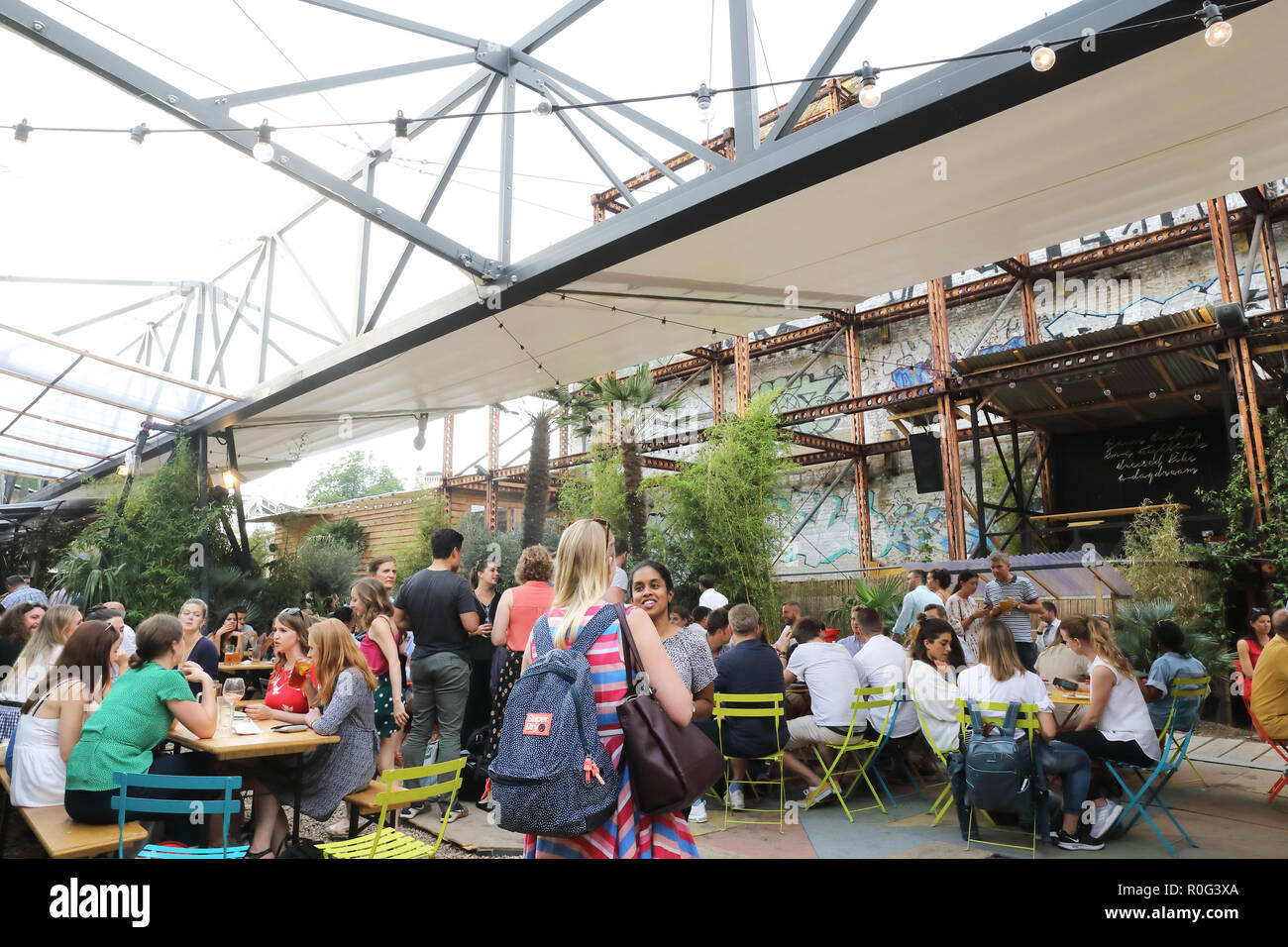 Trendy Mercato Metropolitano, in a disused paper factory, and part of the Elephant & Castle's regeneration project, in SE London, UK Stock Photo