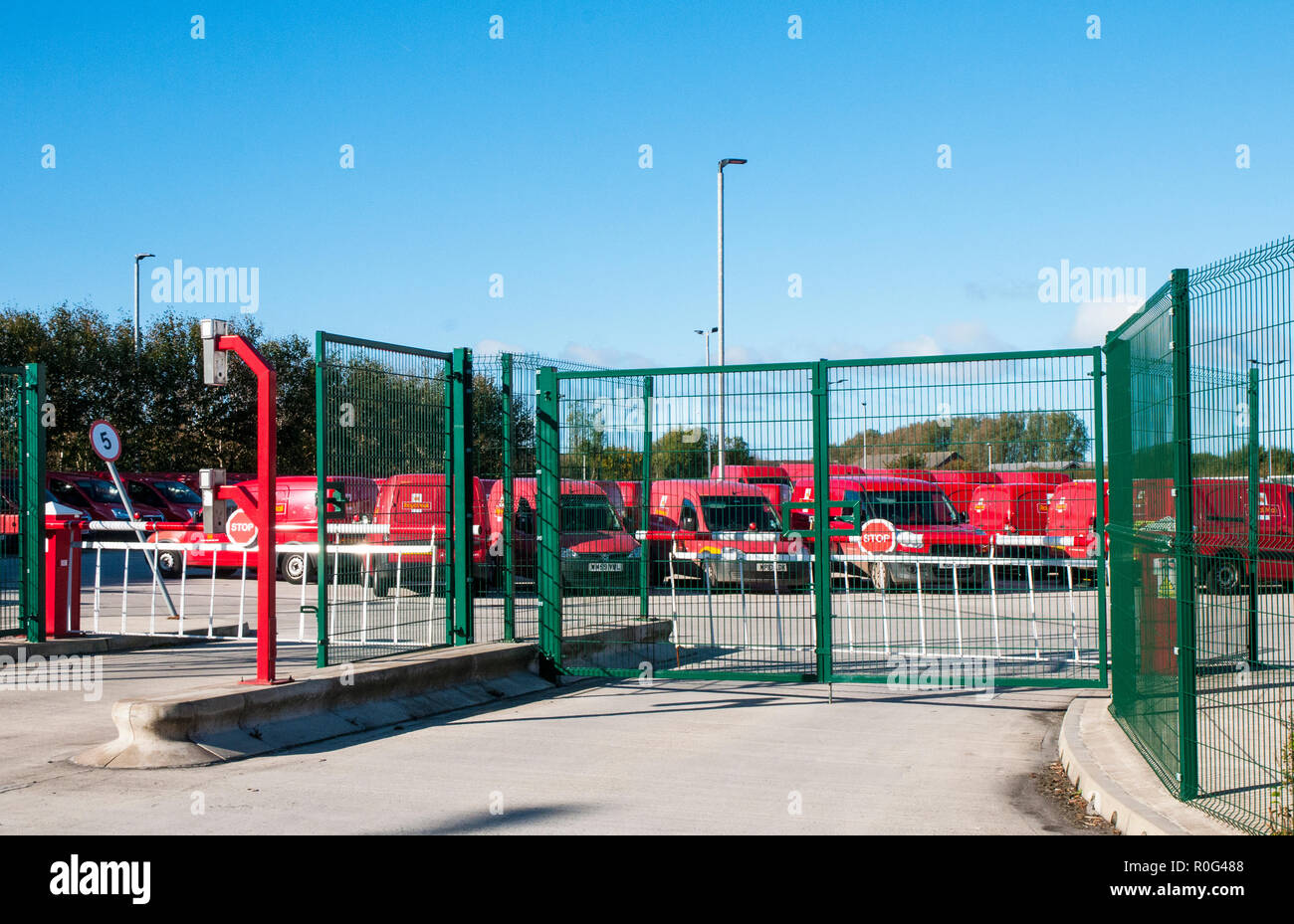 Royal Mail delivery vans parked up in compound at the main sorting