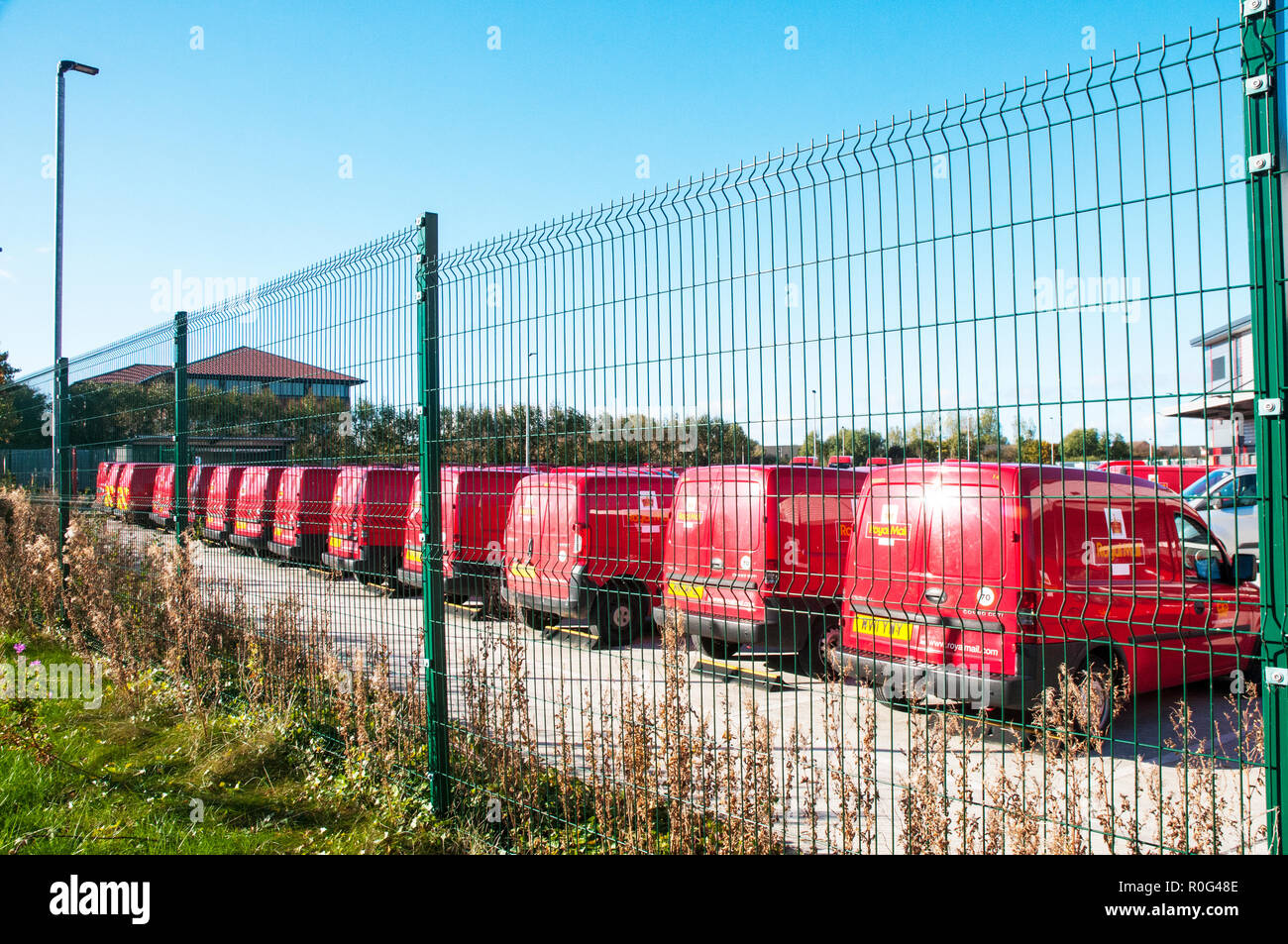 Royal Mail delivery vans parked up in compound at the main sorting office for the Fylde area .Blackpool Lancashire England UK Stock Photo