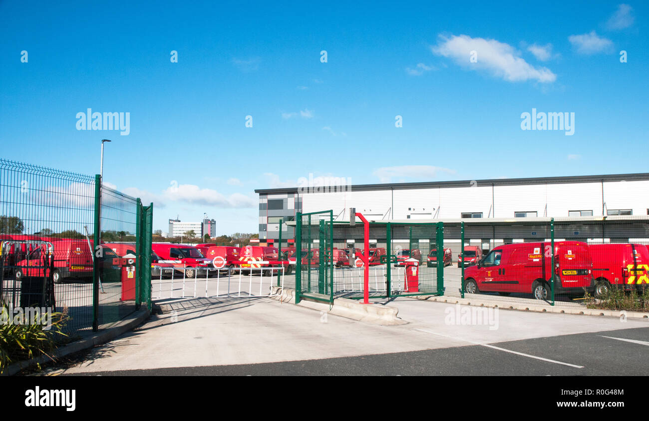 Royal Mail delivery vans parked up in compound at the main sorting