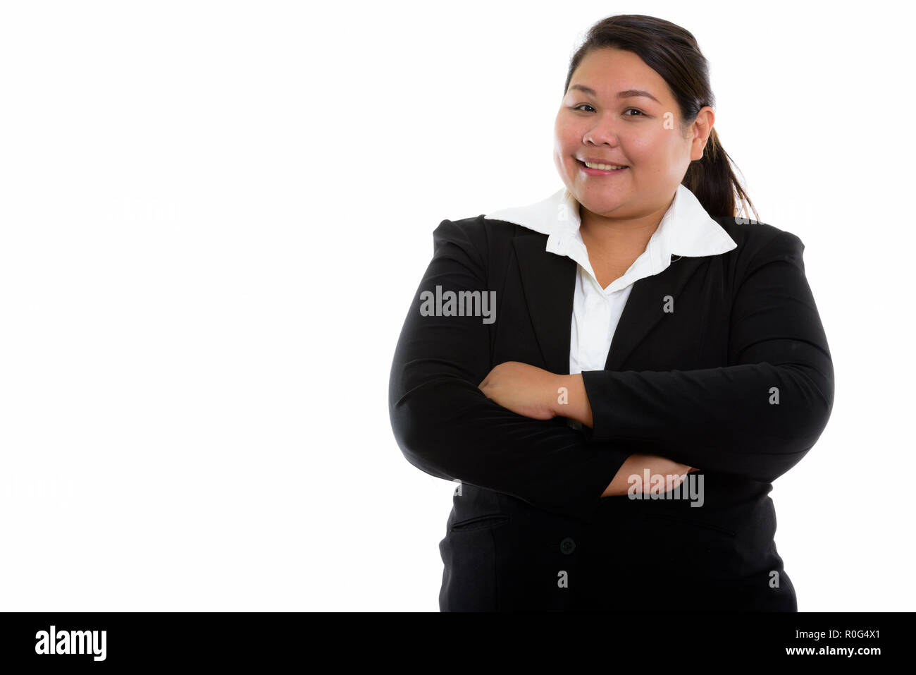 Smiling asian businesswoman arms hi-res stock photography and images ...